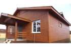 Отделка деревянного дома имитацией бруса